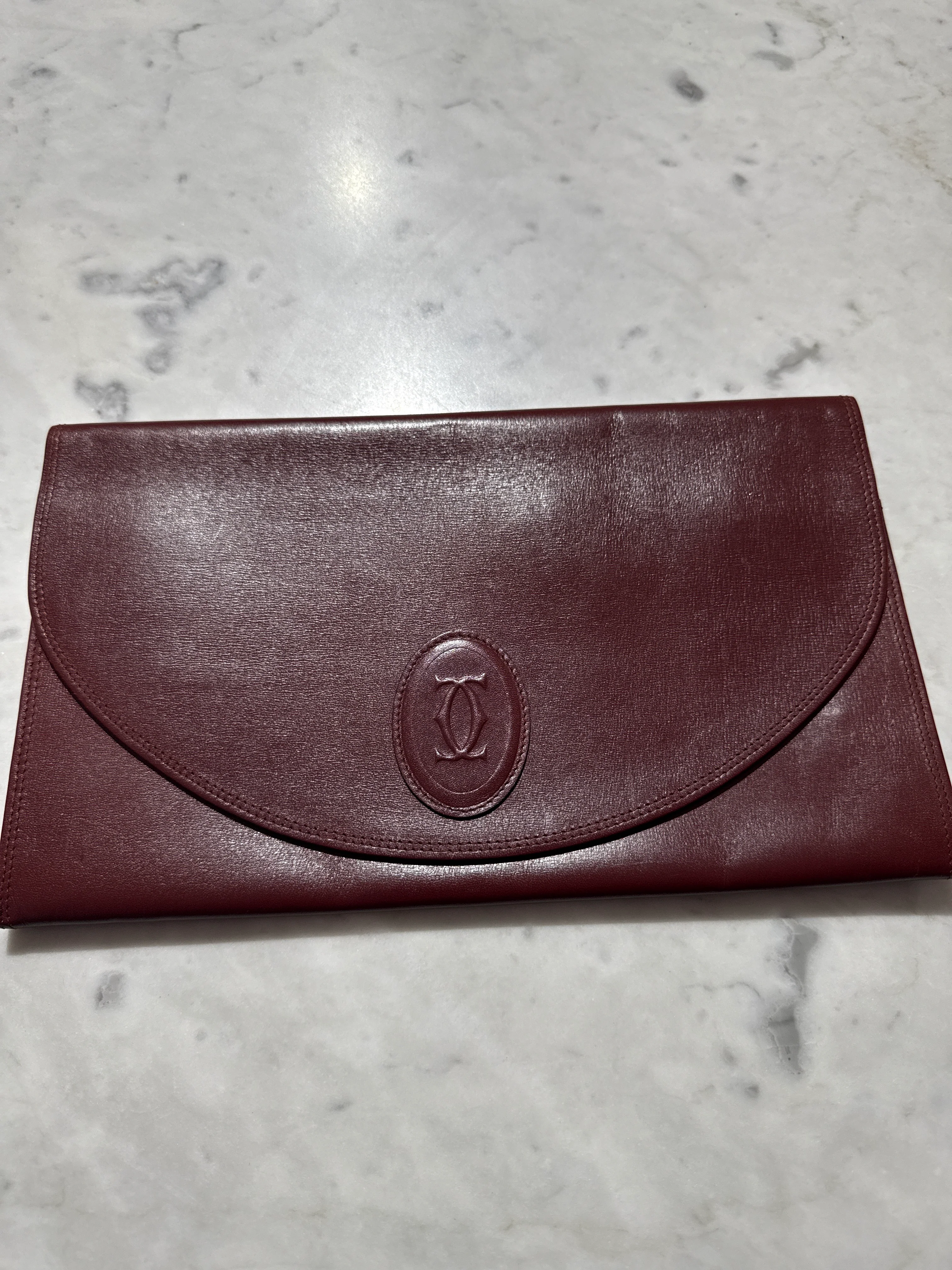 Cartier | Burgundy Leather Clutch  - HV