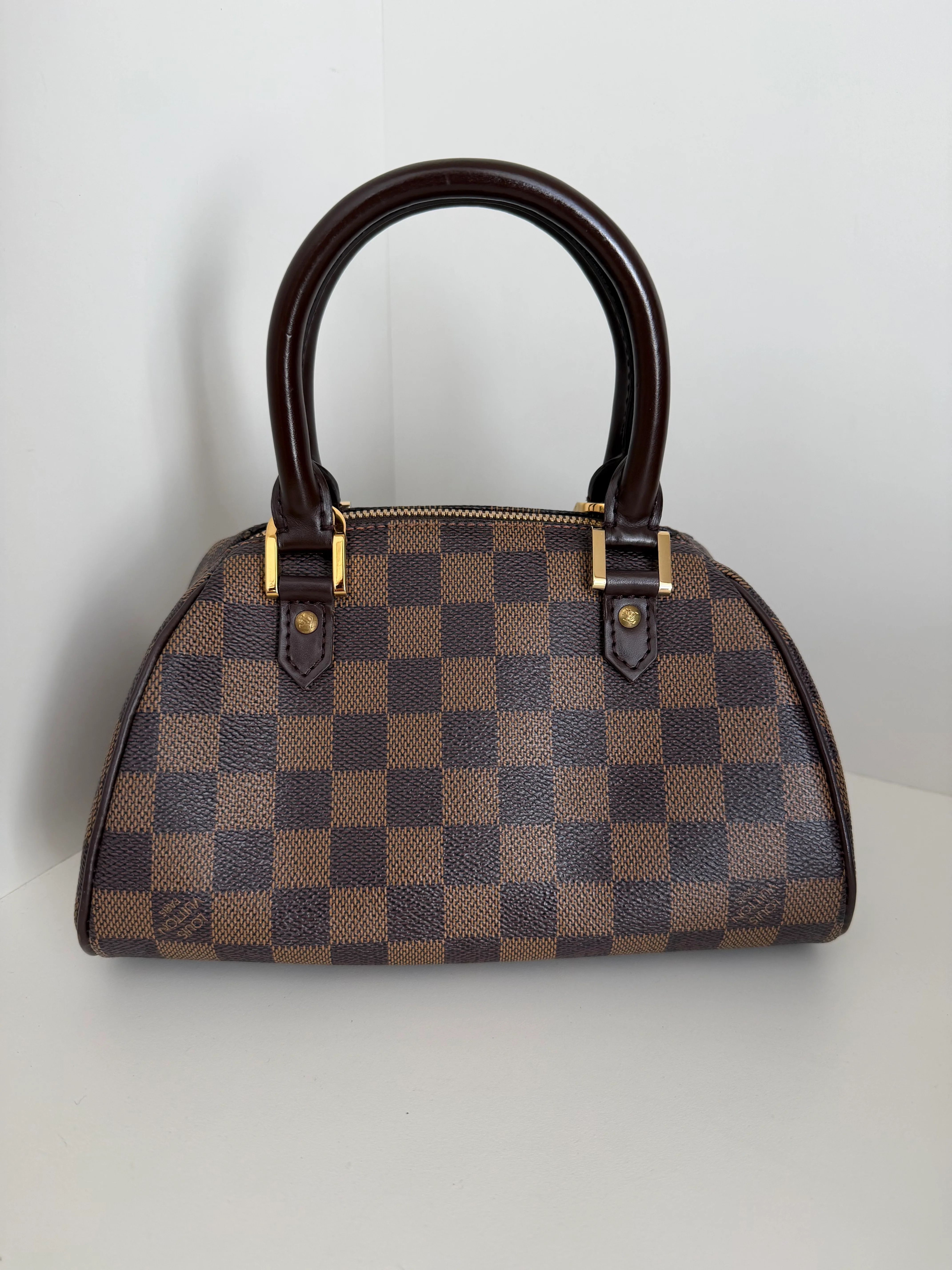 Louis Vuitton - cons