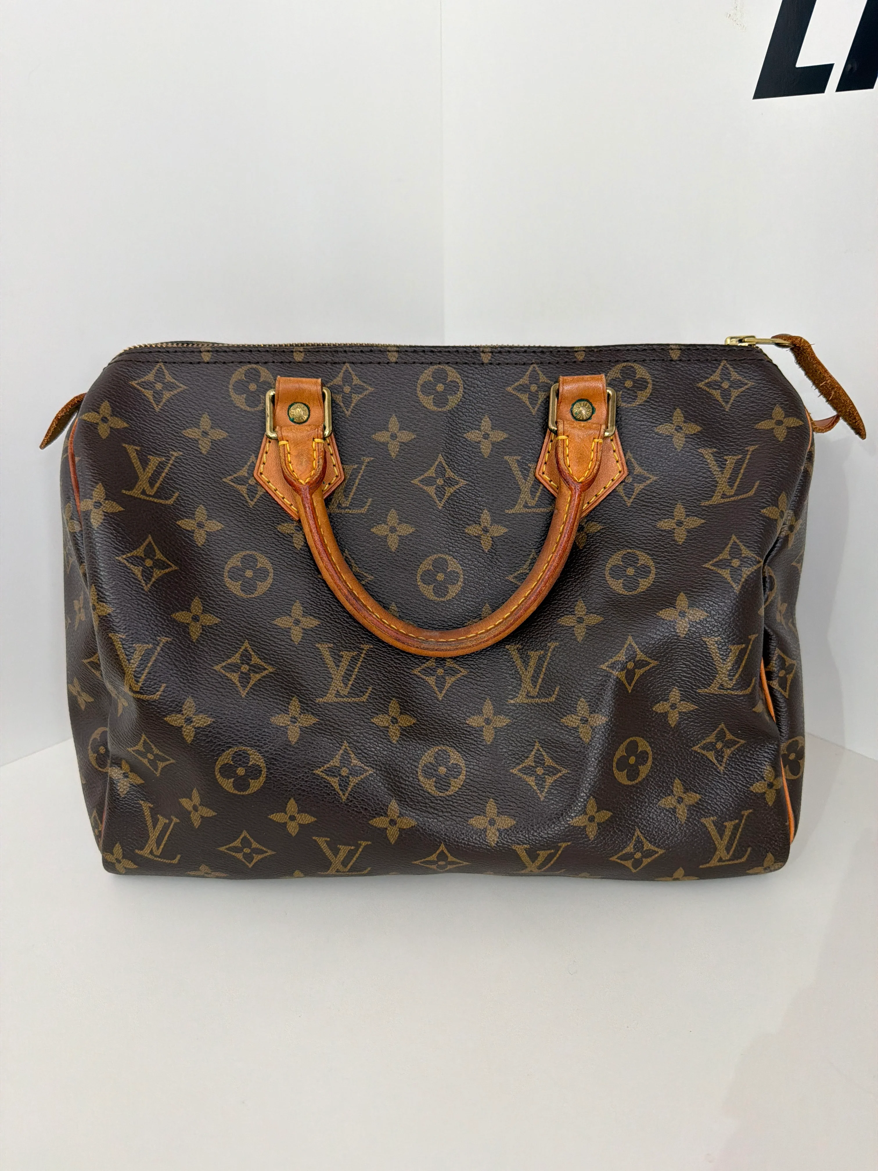 Louis Vuitton | Monogrammed Speedy with Gold Hardware (Good Condition)
